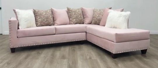 L-Shaped Sectional covered in Pink Velvet Suede with Silver nail heads