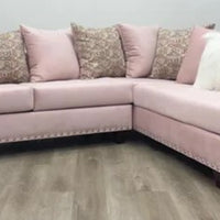 L-Shaped Sectional covered in Pink Velvet Suede with Silver nail heads