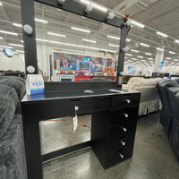 Black Vanity Mirror Set, Rectangular mirror with light bulbs lining the top and sides & Five drawers with silver knobs