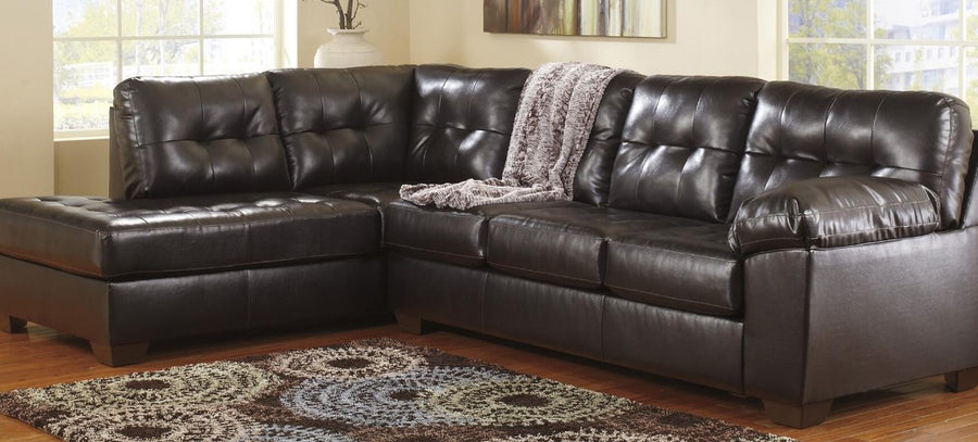 Signature Design by Ashley Rich Durable upholstery surrounds the contemporary sectional sofa