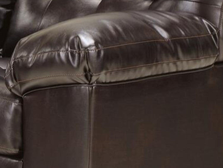 Signature Design by Ashley Rich Durable upholstery surrounds the contemporary sectional sofa