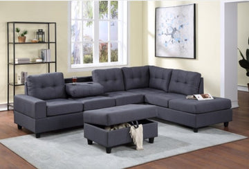 Reversible Gray Fabric Sectional w/Storage Ottoman, Features a drop down table w/cup holders